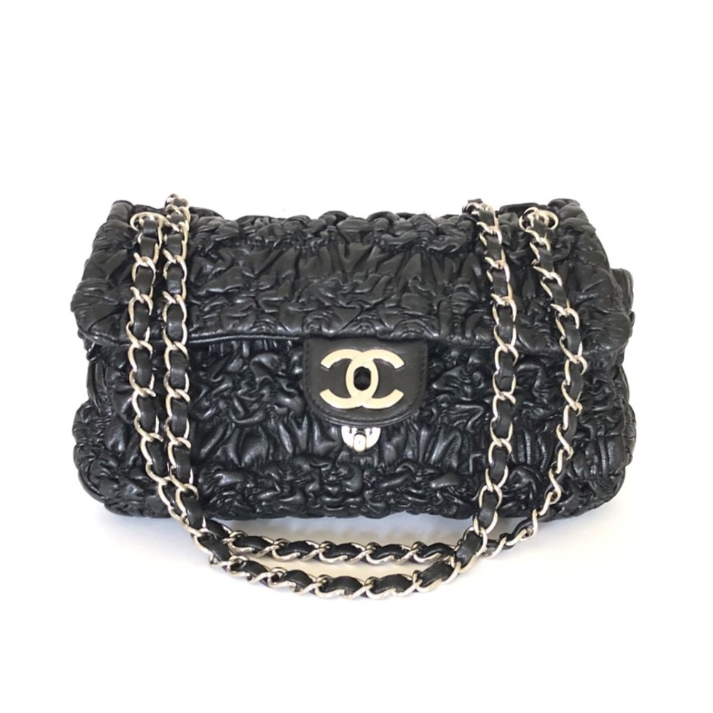 SOLD!   CHANEL ASTRAKHAN FLAP BAG